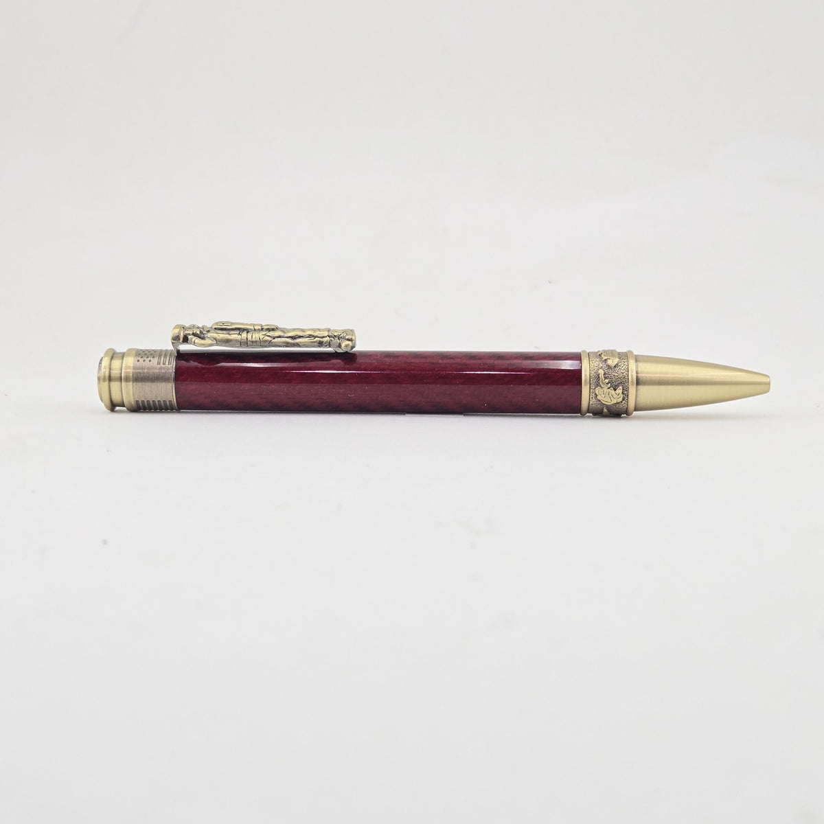 Hand-Turned Military Pen – Sculpted Soldier Clip and USA End Cap Twist Pen - Red Carbon Fiber, Antique Brass