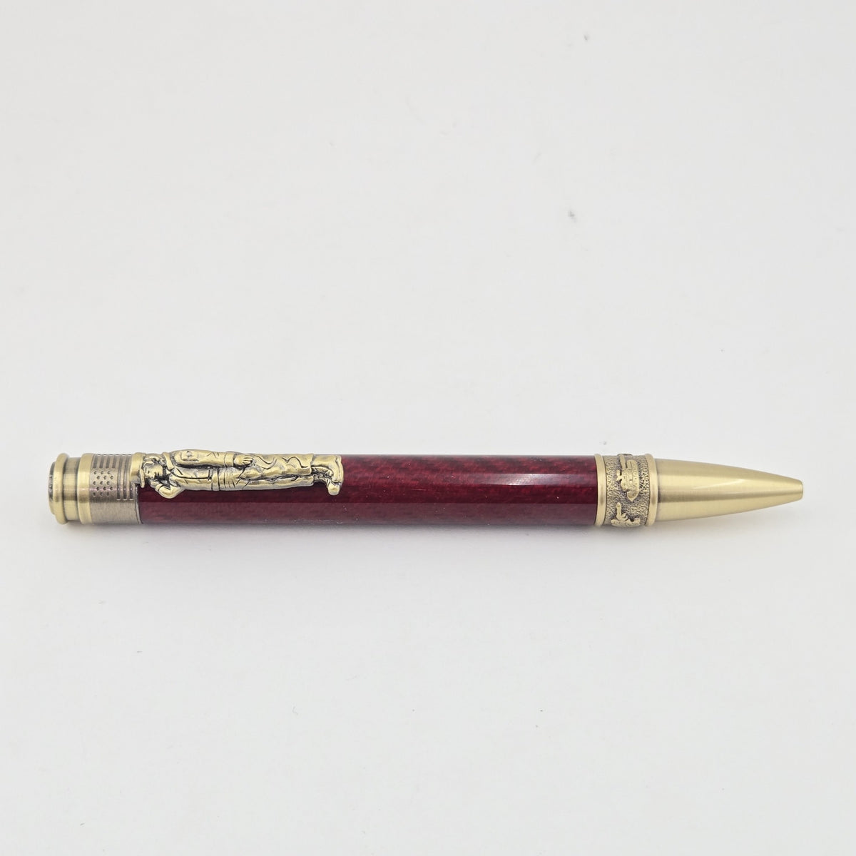 Hand-Turned Military Pen – Sculpted Soldier Clip and USA End Cap Twist Pen - Red Carbon Fiber, Antique Brass